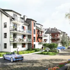 Nowoczesne budynki mieszkalne na osiedlu Rąbieńska, z balkonami, zielenią i samochodami na podjeździe.