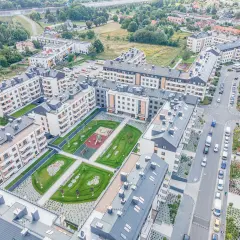 Nowoczesne osiedle z placem zabaw i zielenią, idealne na rodzinne maślice.
